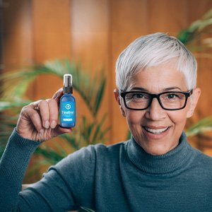 Person Holding Tinnitrol